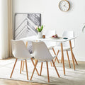 Ensemble table rectangulaire blanche avec quatre chaises assorties, solution complete pour petit espace repas